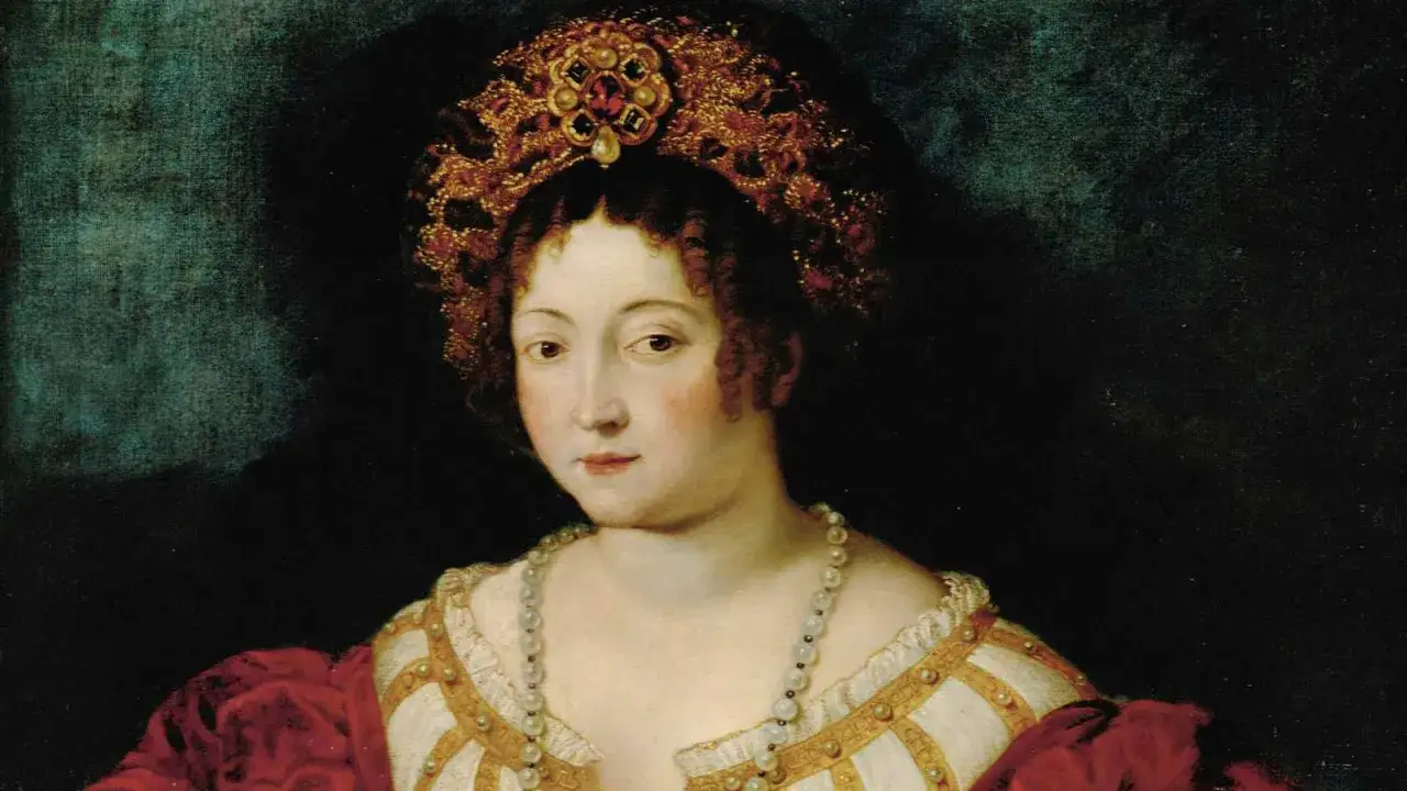 Ritratto di Isabella Maria d'Este, con sontuosa corona e perle, sguardo intenso.